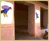 Decorative bas reliefs on the walls of the Royal Palaces of Abomey UNESCO world heritage site (Benin, West Africa)