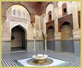 Restored interior courtyard of the splendid Medersa Bou Inania, one of the most beautiful Merenid monuments in the Medina of Fez UNESCO world heritage site, Morocco 