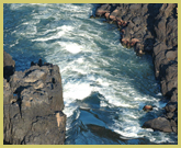 Raging torrent of the Zambezi River as it makes its way through the gorge below Victoria Falls National Park world heritage site, on the border between Zambia and Zimbabwe