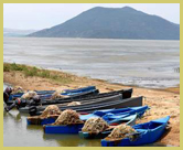 Fishing boats on the lake shoreline at Ichkeul National Park world heritage site, Tunisia 