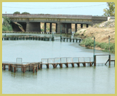 Sluice and fish traps along the lake's principal outlet channel, the Oued Tindja, in the Ichkeul National Park world heritage site, Tunisia