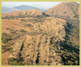 Upturned rock strata resulting from the world’s largest and oldest meteorite impact event at Vredefort Dome world heritage site, South Africa