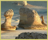 Wind-sculpted sandstone blocks create an extraordinary landscape in the desert at Wadi Al Hitan (Whale Valley) world heritage site in the western deserts of Egypt