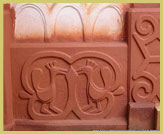 Decorative Bas-reliefs on the walls of the restored shrine house at Besease near Kumasi, one of the Asante Traditional Buildings recognised as a UNESCO world heritage site in Ghana