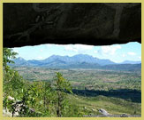 Looking out from a cave, the ceiling lavishly decorated with rock art, one of many such sites in the Chongoni Area UNESCO world heritage site (Malawi)