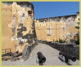 Defensive walls and moat at the main entrance of Fort Jesus UNESCO world heritage site, Mombasa (Kenya)