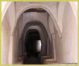 The first floor living quarters are suspended over a network of cool shaded alleyways at ground level in the Old trans-Saharan trading Town of Ghadames (UNESCO world heritage site, Libya)