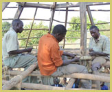 Artisans perfecting the traditional building skills required for reconstruction of the Tombs of the Buganda Kings of Kasubi UNESCO world heritage site (Uganda) following its complete destruction by fire in March 2010