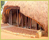 The thickly-thatched gate house at the Tombs of the Buganda Kings of Kasubi UNESCO world heritage site (Uganda)