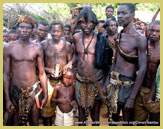 Local people, dressed in animal skins, live a traditional lifestyle in villages neighbouring Salonga National Park (world heritage site, DR Congo)