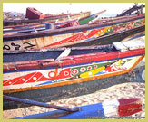 Brightly coloured fishing canoes at the Island of Saint-Louis UNESCO world heritage site, Senegal