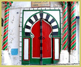 Distinctively painted entrance to one of the numerous Hammams (public bath houses) in the Medina of Tunis UNESCO world heritage site, Tunisia