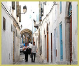 Narrow, deeply shaded streets ensure a cool environment in the Medina of Tunis UNESCO world heritage site, Tunisia